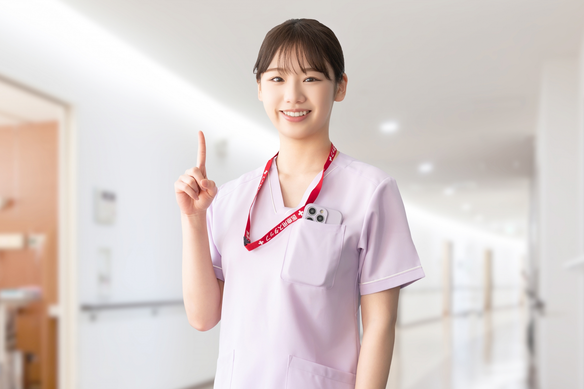 人差し指を出す女性