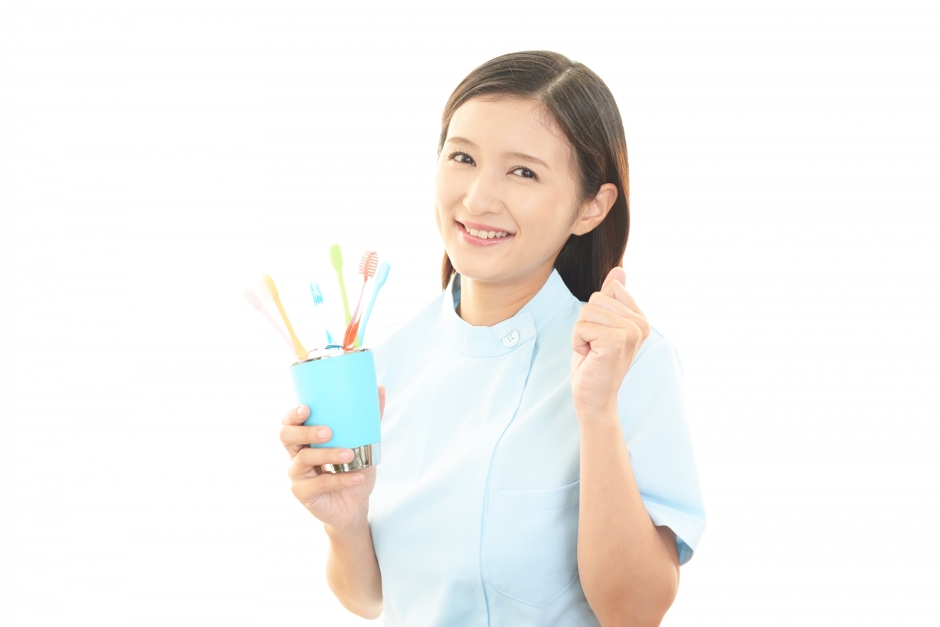 歯ブラシを持った女性