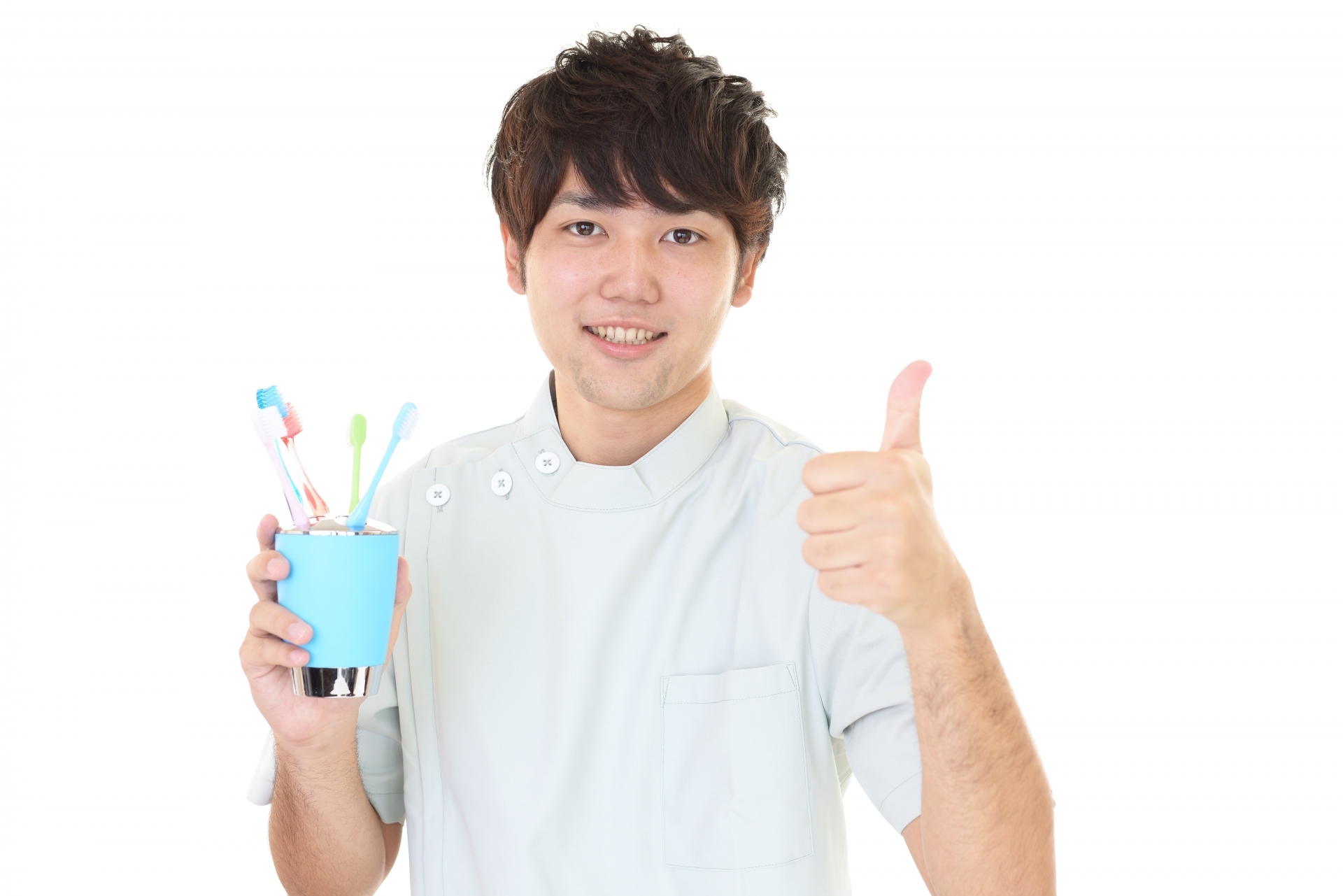 歯ブラシを持った男性